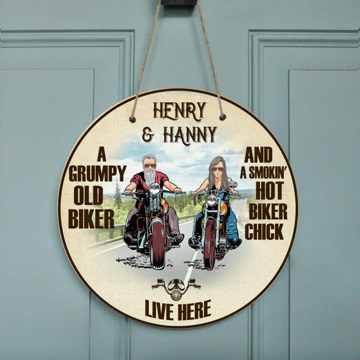 Custom Personalized Couple Biker Circle Door Sign - Gift Idea For Couple - A Grumpy Old Biker And A Smokin' Hot Biker Chick Live Here