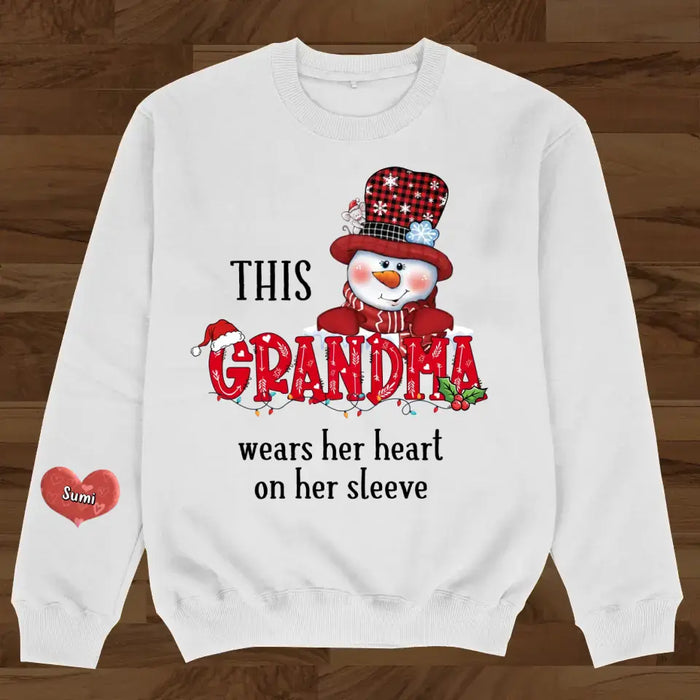 Custom Personalized Grandma AOP Sweater - Upto 10 Grandkids - Christmas Gift Idea For Grandma - This Grandma Wears Her Heart In Her Sleeve