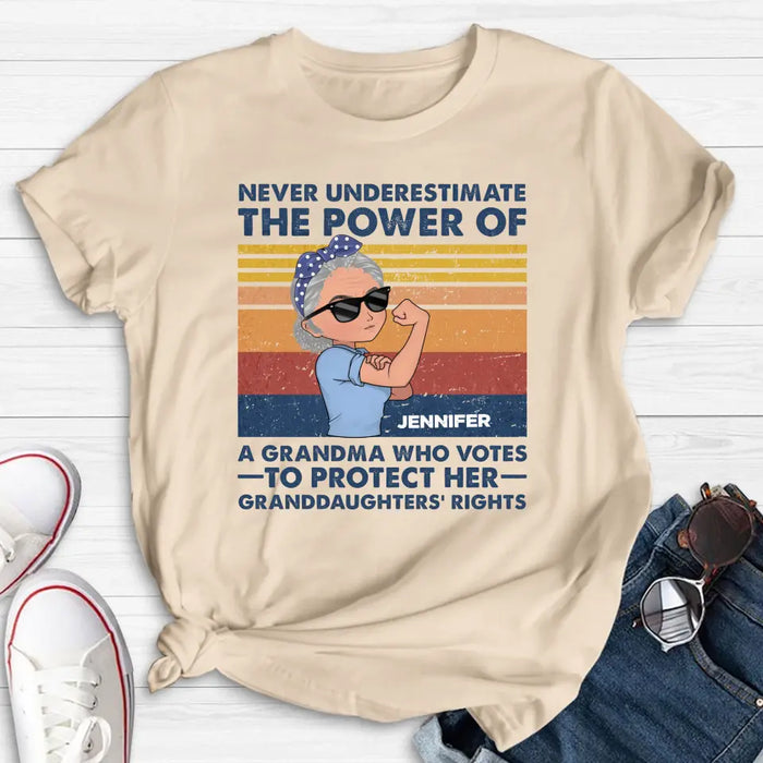 Custom Personalized Grandma Votes T-shirt/ Long Sleeve/ Sweatshirt/ Hoodie - Gift Idea For Grandma - Never Underestimate The Power Of A Grandma Who Votes To Protect Her Granddaughters' Rights