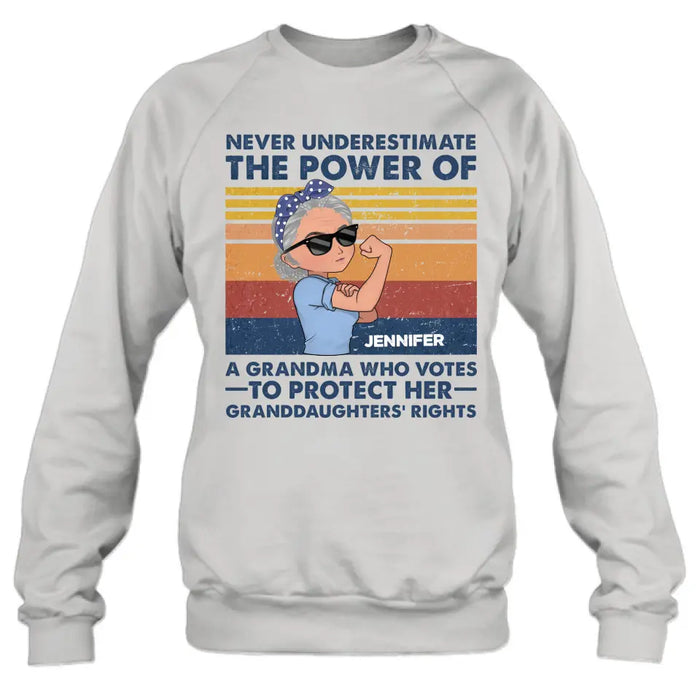 Custom Personalized Grandma Votes T-shirt/ Long Sleeve/ Sweatshirt/ Hoodie - Gift Idea For Grandma - Never Underestimate The Power Of A Grandma Who Votes To Protect Her Granddaughters' Rights