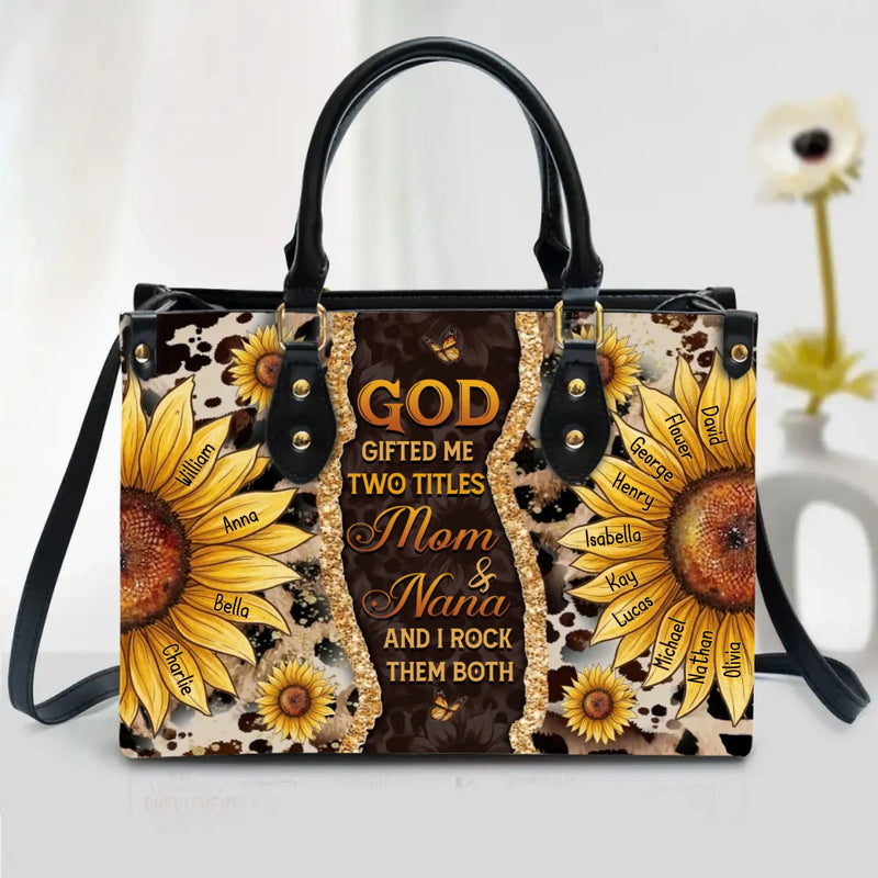 Personalized Grandma PU Leather Handbag with Long Straps - Mother's Day Gift Idea For Mom/ Grandma/ Nana with up to 14 Kids - God Gifted Me Two Titles Mom & Nana and I Rock Them Both